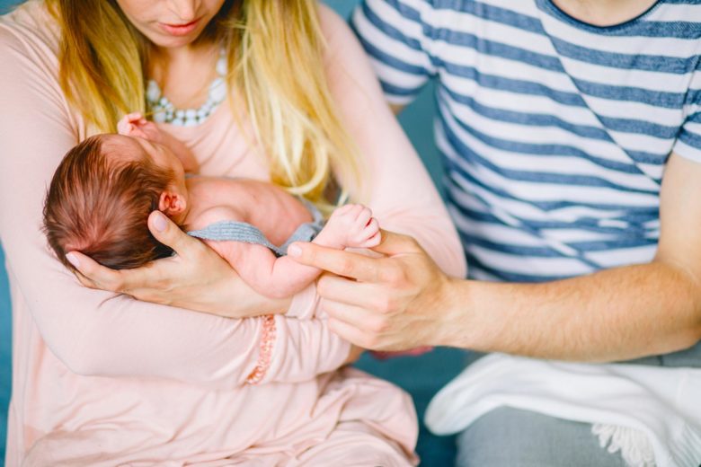 a man and woman with their newborn with Life Insurance in Melville, NY, Deer Park, White Plains, Lake Success, NY, Yonkers, Huntington, NY and Nearby Cities